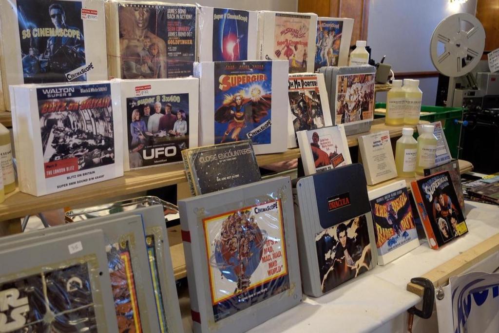 Super 8 films for sale on a dealer's table at the Sunday Film Fair.
