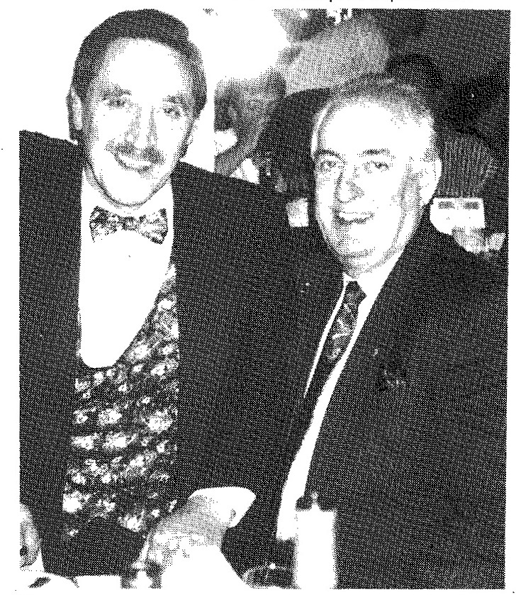 Derek Simmonds in fancy waistcoat and bow tie, and Geoff Wheeler pose for a picture at the Convention Dinner